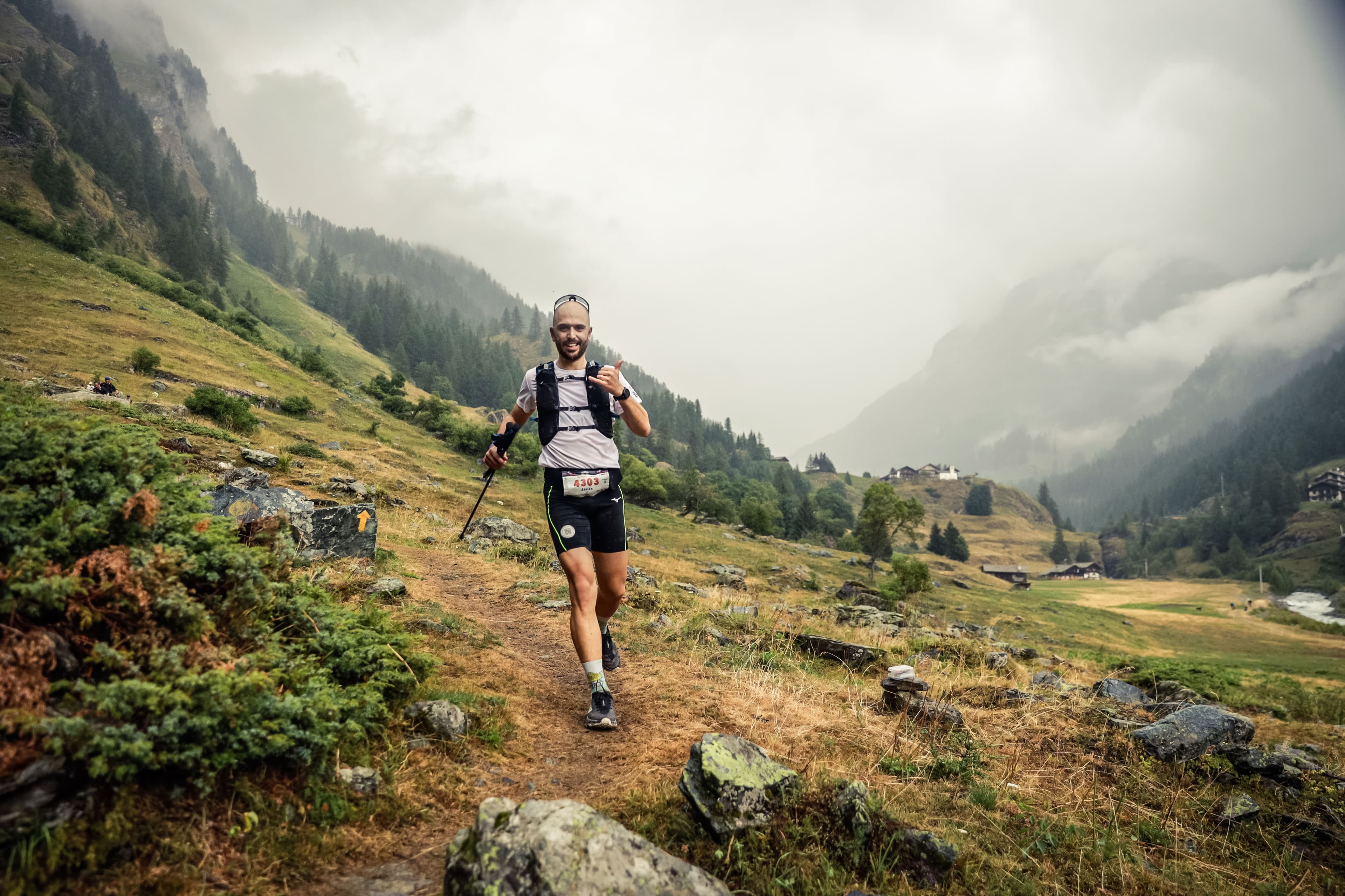 Adrien running a trail race in the Alps
